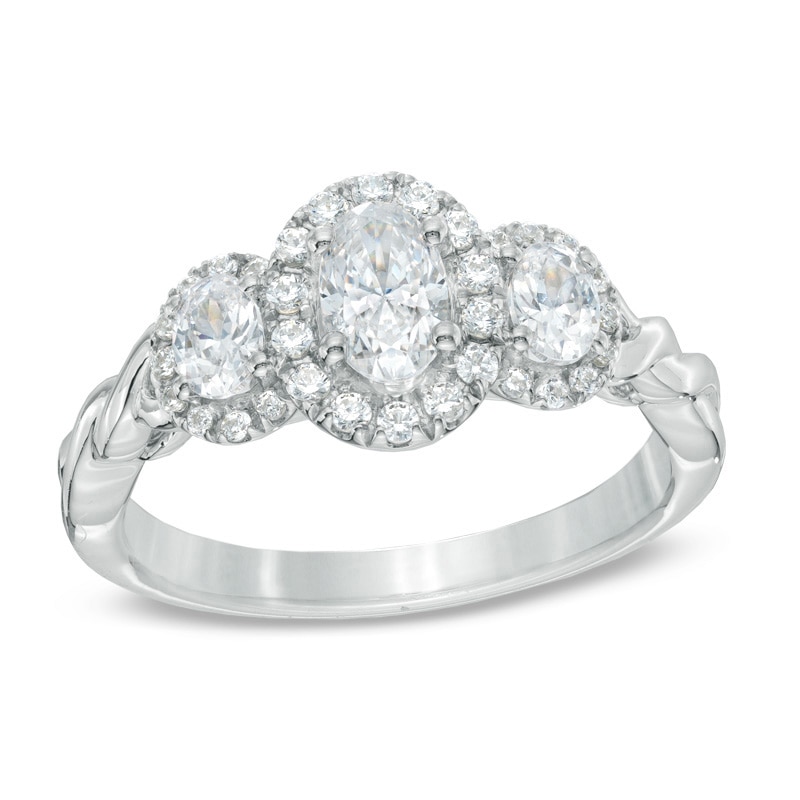 Celebration Ideal 1 CT. T.W. Oval Diamond Three Stone Engagement Ring in 14K White Gold (I/I1)