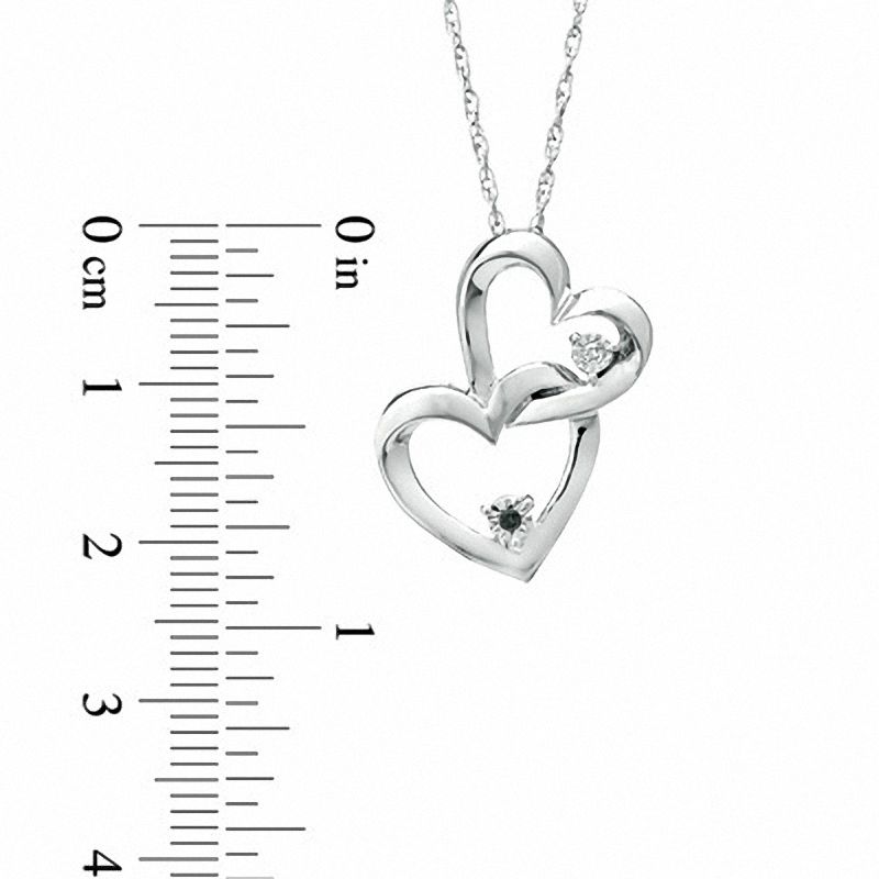 Enhanced Black and White Diamond Accent Interlocking Hearts Pendant in Sterling Silver