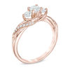 Thumbnail Image 1 of 3/4 CT. T.W. Diamond Past Present Future® Twist Engagement Ring in 14K Rose Gold