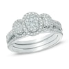 Thumbnail Image 1 of 1/2 CT. T.W. Diamond Oval Frame Three Stone Cluster Three Piece Bridal Set in 10K White Gold