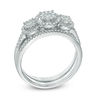 Thumbnail Image 1 of 1/2 CT. T.W. Diamond Frame Three Stone Cluster Three Piece Bridal Set in 10K White Gold