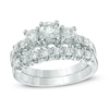 Thumbnail Image 0 of 1-1/4 CT. T.W. Certified Canadian Diamond Three Stone Bridal Set in 14K White Gold (I/I1)