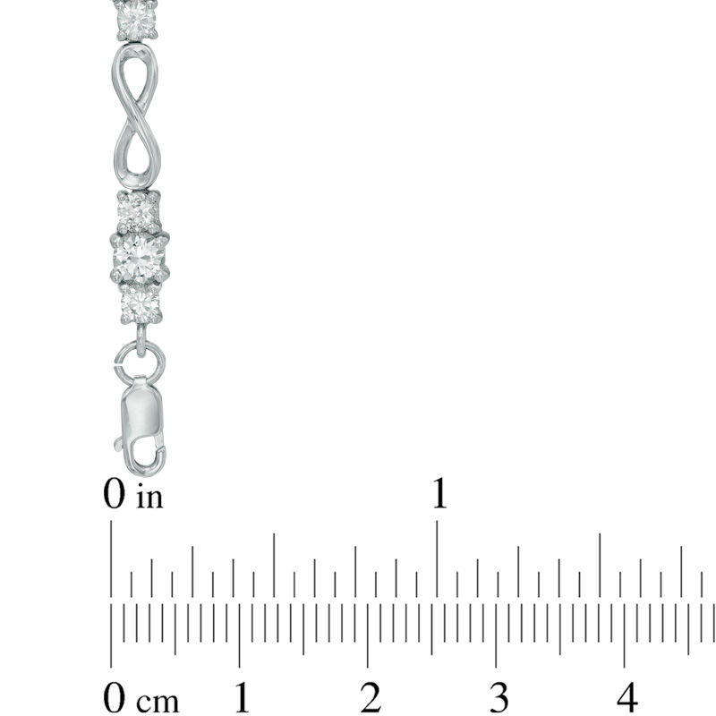 Main Image 2 of Lab-Created White Sapphire Infinity Link Three Stone Bracelet in Sterling Silver - 7.25"