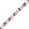 Thumbnail Image 1 of Baguette Lab-Created Ruby and White Sapphire Line Bracelet in Sterling Silver with 14K Gold Plate - 7.25"