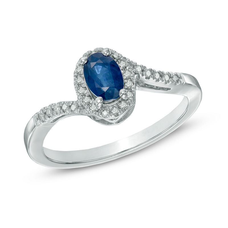 Main Image 1 of Oval Blue Sapphire and 1/10 CT. T.W. Diamond Frame Ring in 10K White Gold