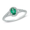 Thumbnail Image 1 of Oval Emerald and 1/6 CT. T.W. Diamond Frame Ring in 10K White Gold