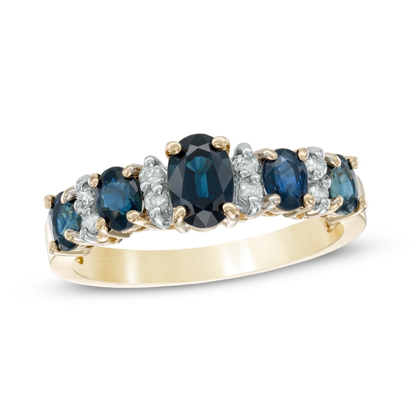 Oval Blue Sapphire and 1/8 CT. T.W. Diamond Band in 14K Gold