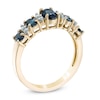 Thumbnail Image 1 of Oval Blue Sapphire and 1/8 CT. T.W. Diamond Band in 14K Gold