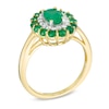Thumbnail Image 1 of Oval Emerald and 1/6 CT. T.W. Diamond Double Frame Ring in 14K Gold