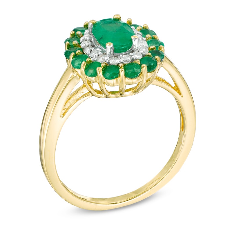 Oval Emerald and 1/6 CT. T.W. Diamond Double Frame Ring in 14K Gold