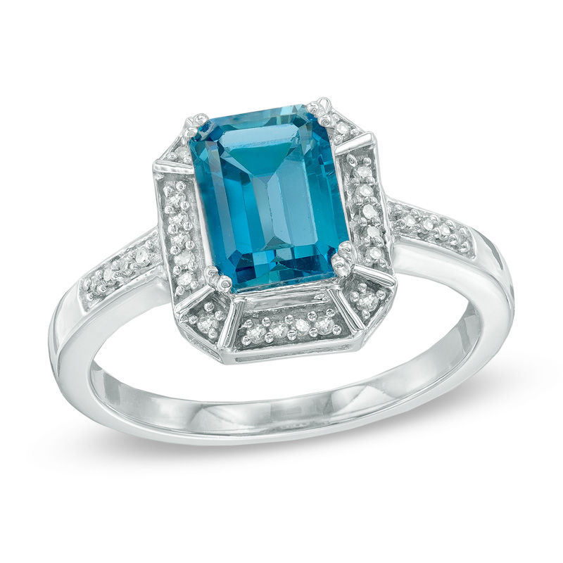 Emerald-Cut London Blue Topaz and 1/10 CT. T.W. Diamond Frame Ring in Sterling Silver
