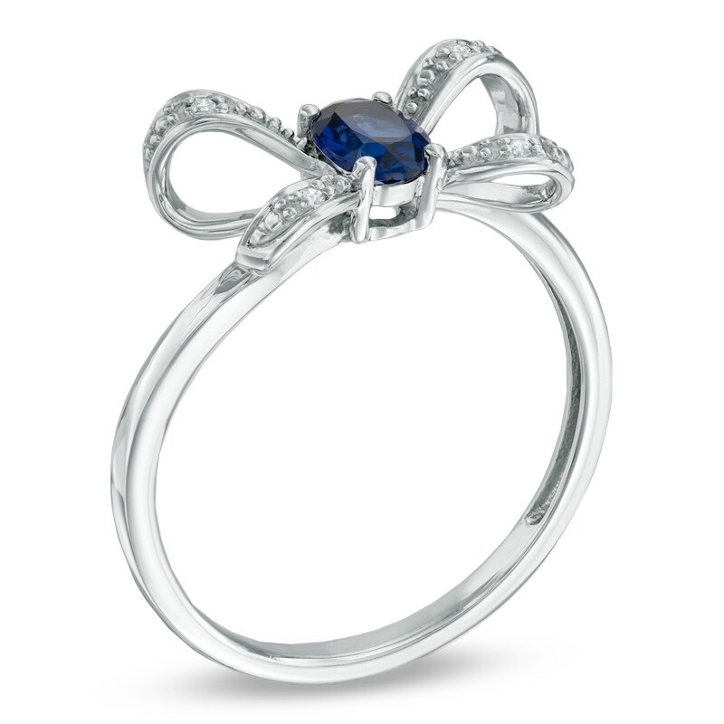 Main Image 2 of Oval Lab-Created Blue Sapphire and Diamond Accent Bow Ring in 10K White Gold