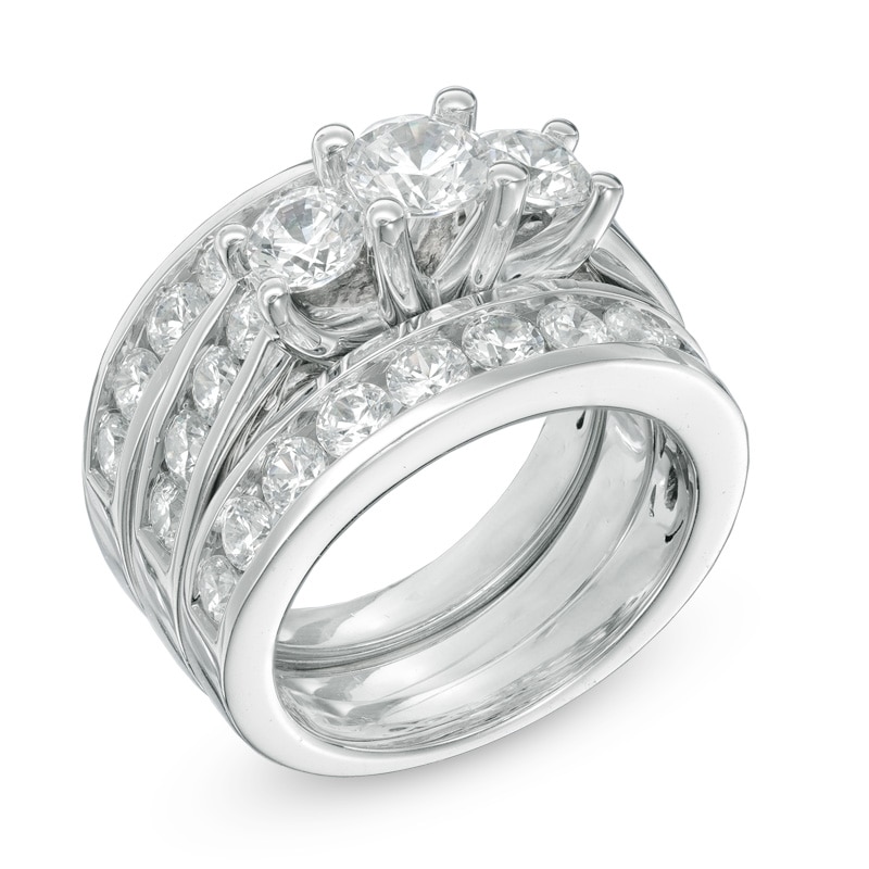4 CT. T.W. Diamond Past Present Future® Three Piece Bridal Set in 14K White Gold