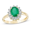Thumbnail Image 0 of Oval Emerald and 1/5 CT. T.W. Diamond Frame Ring in 14K Gold