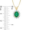 Thumbnail Image 2 of Oval Emerald and 1/5 CT. T.W. Diamond Frame Pendant in 14K Gold
