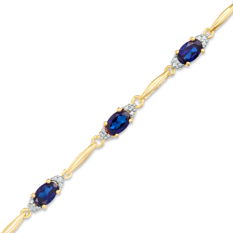 Oval Lab-Created Blue Sapphire and Diamond Accent Bracelet in Sterling Silver and 10K Gold Plate- 7.25"