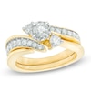 1 CT. T.W. Diamond Three Stone Slant Bridal Set in 14K Gold