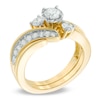 1 CT. T.W. Diamond Three Stone Slant Bridal Set in 14K Gold