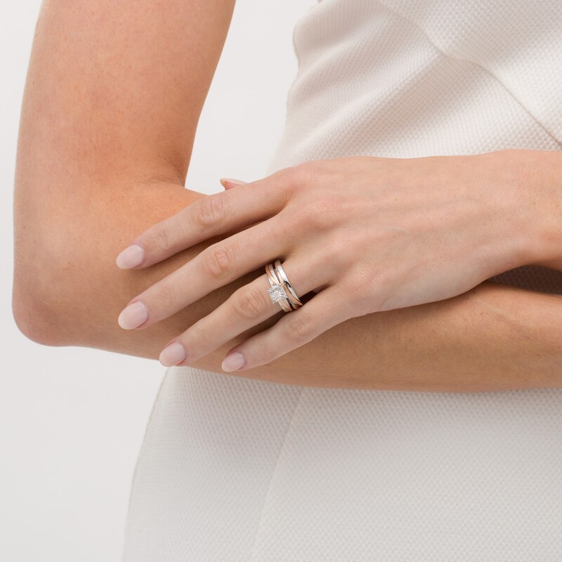 1/6 CT. T.W. Diamond Square Frame Slant Trio Wedding Ensemble in Sterling Silver and 10K Rose Gold
