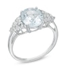 Oval Blue Topaz Ring in Sterling Silver with White Topaz Accents