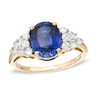 Thumbnail Image 0 of Oval Lab-Created Ceylon Sapphire Ring in Sterling Silver and 14K Gold Plate with White Topaz Accents