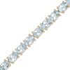 Thumbnail Image 1 of Oval Blue Topaz Fashion Bracelet in Sterling Silver and 18K Gold Plate - 7.5"