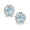 Oval Blue Topaz Glitter Stud Earrings in Sterling Silver
