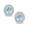 Oval Blue Topaz Glitter Stud Earrings in Sterling Silver
