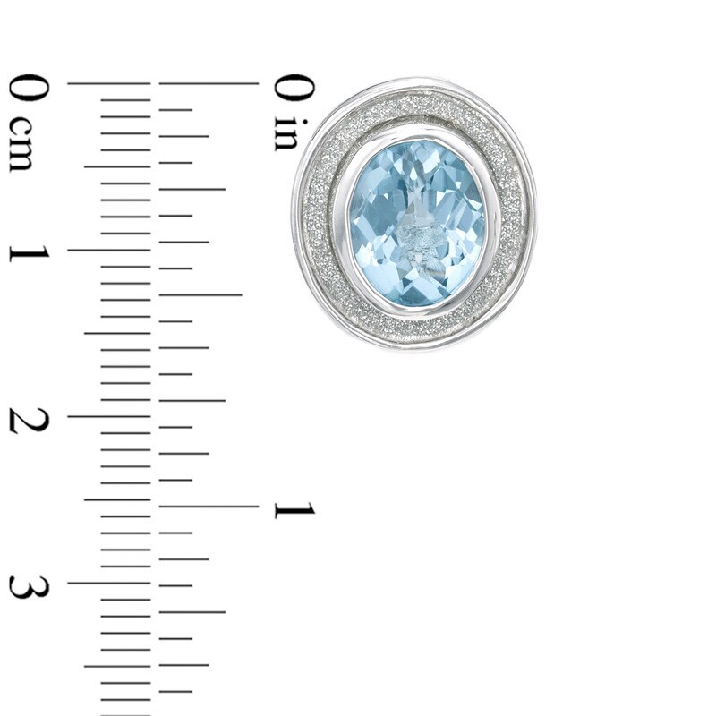 Oval Blue Topaz Glitter Stud Earrings in Sterling Silver