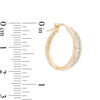 Thumbnail Image 1 of 1/2 CT. T.W. Diamond Channel-Set Oval Hoop Earrings in 14K Gold