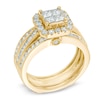 1-1/2 CT. T.W. Quad Princess-Cut Diamond Frame Bridal Set in 14K Gold