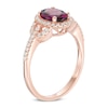 Thumbnail Image 1 of Precious Bride™ Oval Rhodolite Garnet and 1/4 CT. T.W. Diamond Frame Engagement Ring in 14K Rose Gold