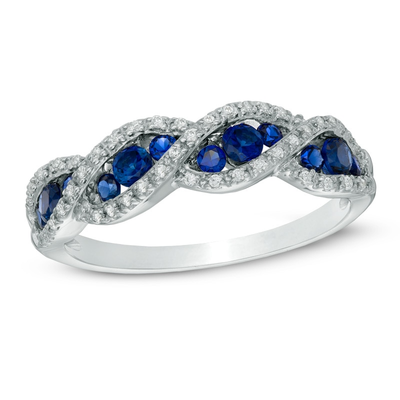 Lab-Created Blue and White Sapphire Cascading Three Stone Band in Sterling Silver