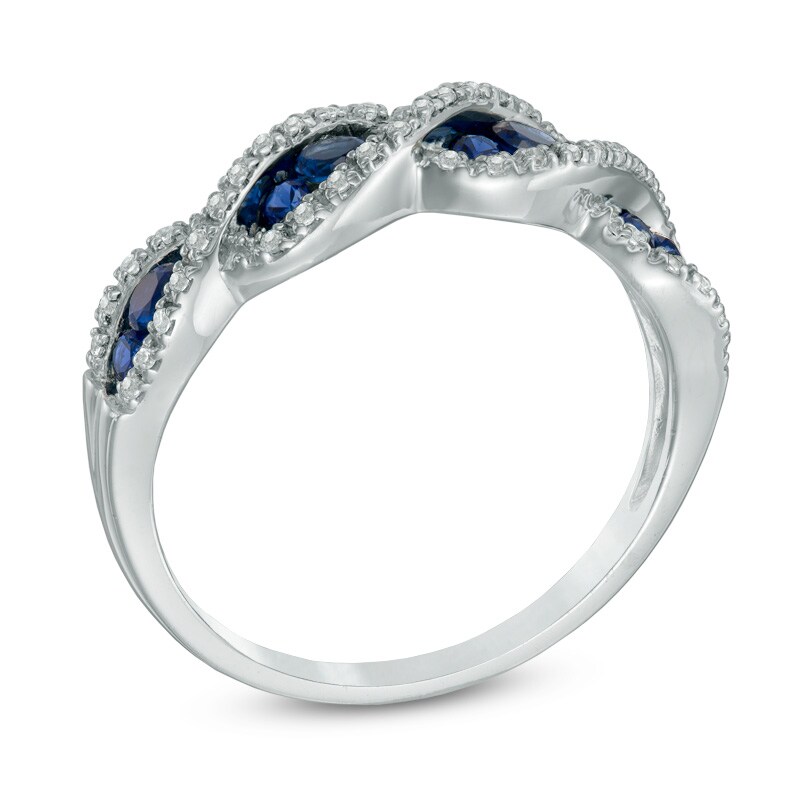 Lab-Created Blue and White Sapphire Cascading Three Stone Band in Sterling Silver