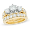 Thumbnail Image 0 of 2-3/4 CT. T.W. Diamond Past Present Future® Bridal Set in 14K Gold