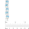 Thumbnail Image 1 of Multi-Shaped Blue Topaz and Lab-Created Opal Cluster Bracelet in Sterling Silver - 7.25"