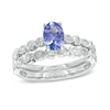 Thumbnail Image 1 of Precious Bride™ Oval Tanzanite and 1/5 CT. T.W. Diamond Bridal Set in 14K White Gold