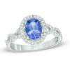 Thumbnail Image 0 of Precious Bride™ Oval Tanzanite and 1/3 CT. T.W. Diamond Frame Twist Engagement Ring in 14K White Gold
