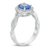 Thumbnail Image 1 of Precious Bride™ Oval Tanzanite and 1/3 CT. T.W. Diamond Frame Twist Engagement Ring in 14K White Gold