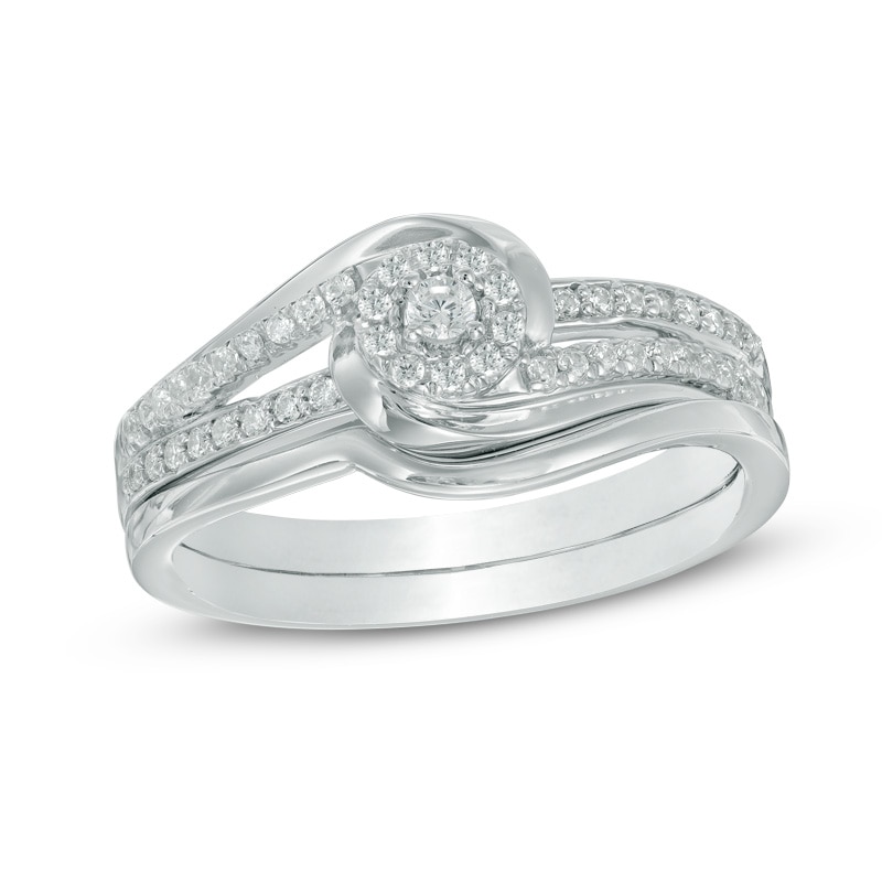 1/4 CT. T.W. Diamond Swirl Frame Bridal Set in 10K White Gold