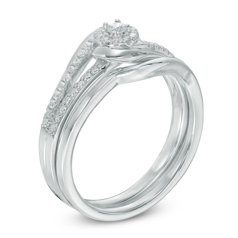 1/4 CT. T.W. Diamond Swirl Frame Bridal Set in 10K White Gold