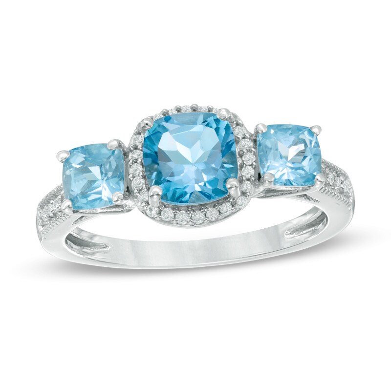 6.0mm Cushion-Cut Blue Topaz and Lab-Created White Sapphire Frame Three Stone Ring in Sterling Silver