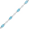 Thumbnail Image 1 of Oval Swiss Blue Topaz Rope Bracelet in Sterling Silver - 7.5"