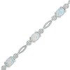 Thumbnail Image 0 of Oval Lab-Created Opal Rope Bracelet in Sterling Silver - 7.5"