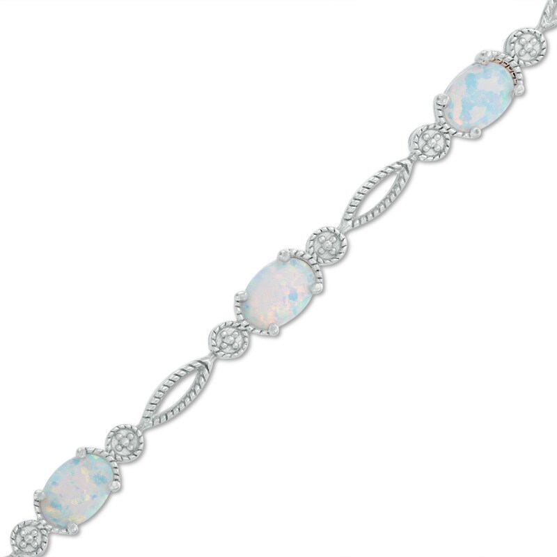 Main Image 1 of Oval Lab-Created Opal Rope Bracelet in Sterling Silver - 7.5"