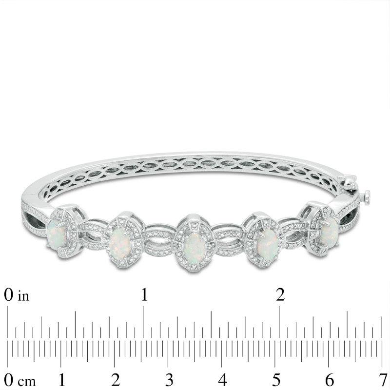 Main Image 2 of Oval Lab-Created Opal and Diamond Accent Bangle in Sterling Silver, 7.5"
