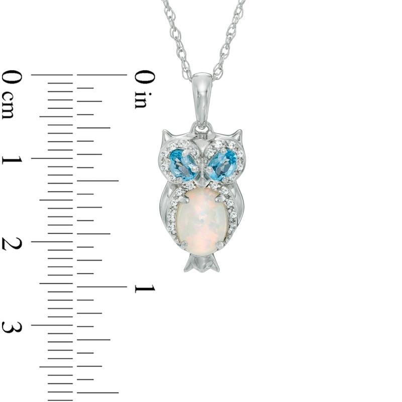 Main Image 2 of Oval Lab-Created Opal, White Sapphire and Swiss Blue Topaz Owl Pendant in Sterling Silver