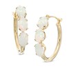 Thumbnail Image 1 of Oval Lab-Created Opal Three Stone Hoop Earrings in 10K Gold
