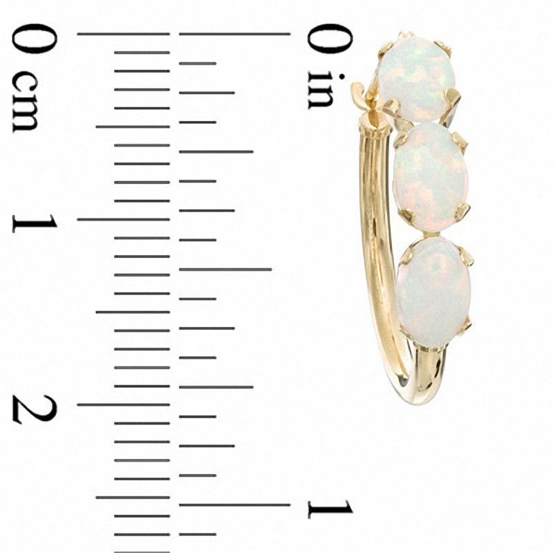 Main Image 2 of Oval Lab-Created Opal Three Stone Hoop Earrings in 10K Gold