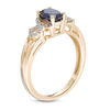 Thumbnail Image 1 of Oval Lab-Created Blue and White Sapphire Twist Ring in 10K Gold